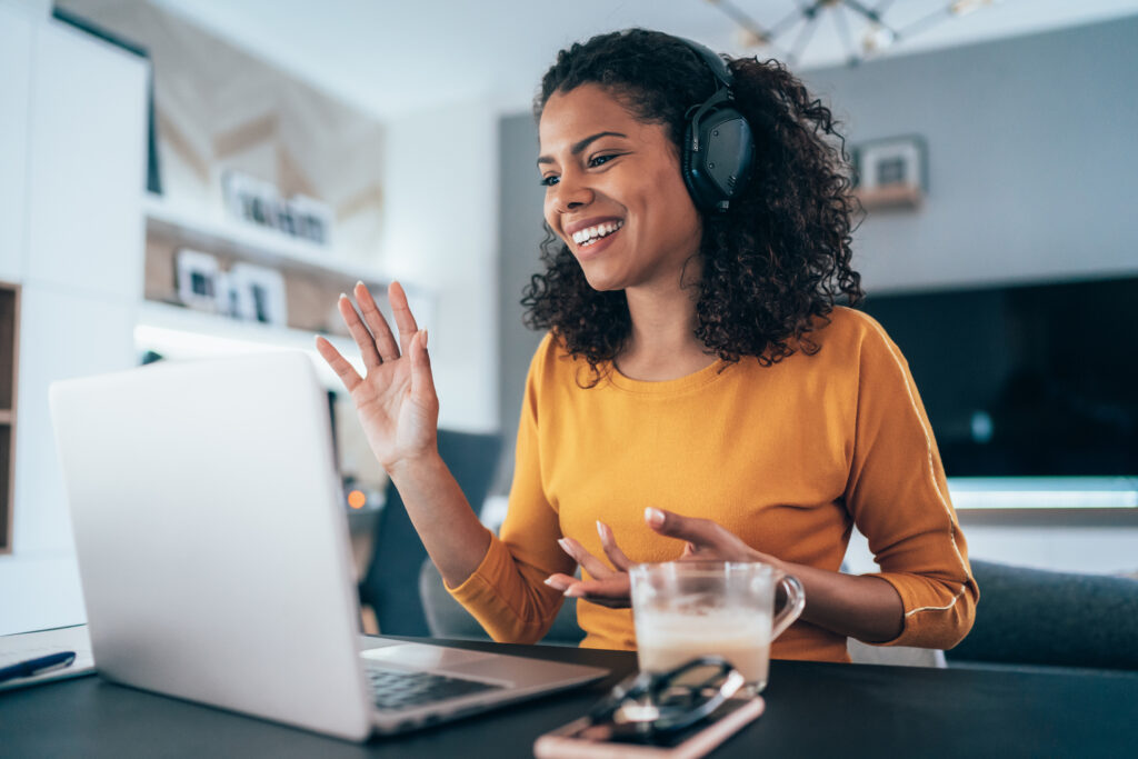 Internal communication example: Young modern woman having Video Conference at home